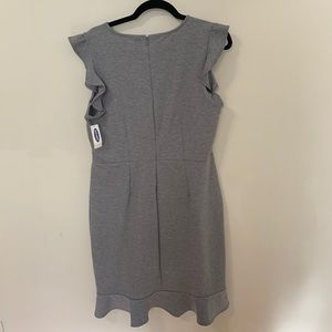 grey dress with frill on the bottom